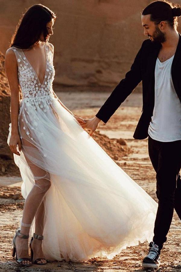 a line plunging neckline appliques tulle outdoor wedding dress with split