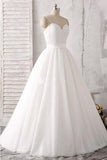 sweetheart floor length wedding dress with spaghetti straps
