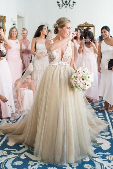 a line deep v neck tulle wedding dress with lace appliques top