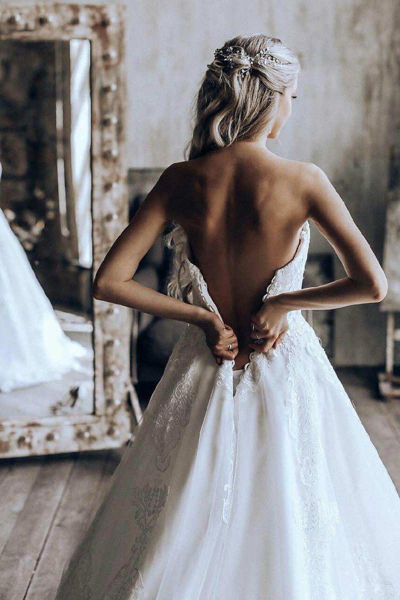 princess strapless ball gown wedding dress with appliques