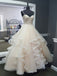 light champagne tulle lace tiered wedding dress with spaghetti straps