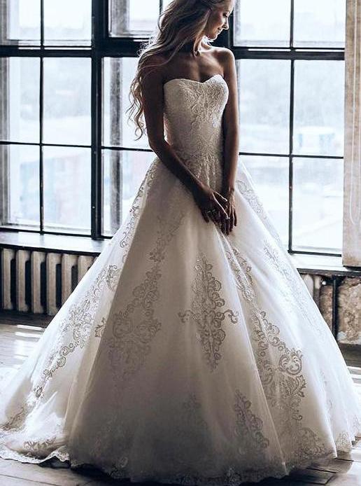 princess strapless ball gown wedding dress with appliques